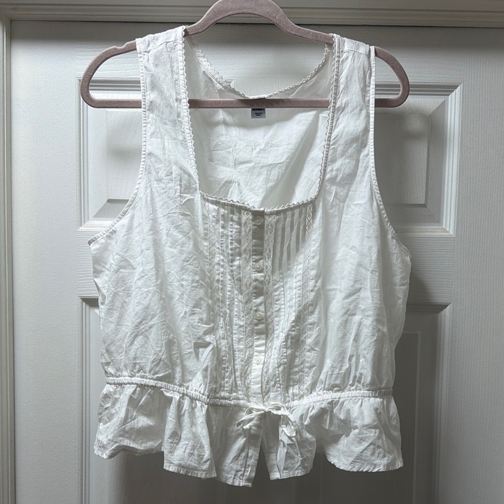 White Sleeveless Button-Front Ruffled Hem Top